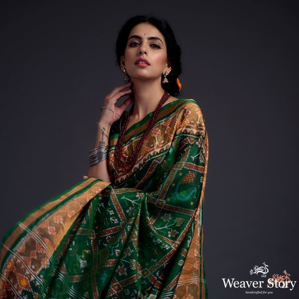 Emerald green single ikat patola saree with tissue border