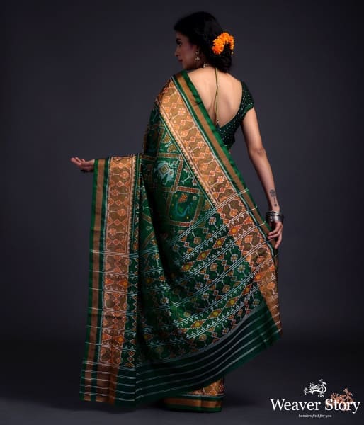 Emerald green single ikat patola saree with tissue border