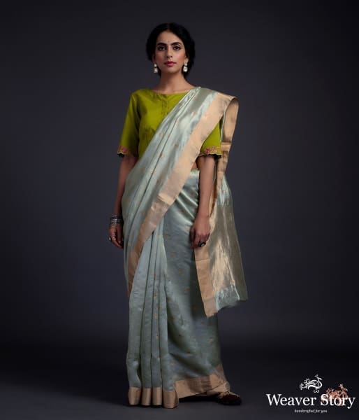 Sage green chanderi silk saree with small floral motifs