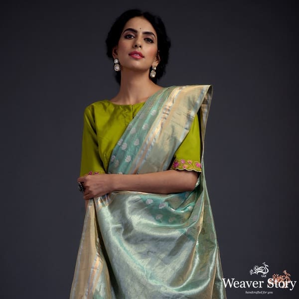 Green chanderi silk saree with floral motifs and a tissue weft