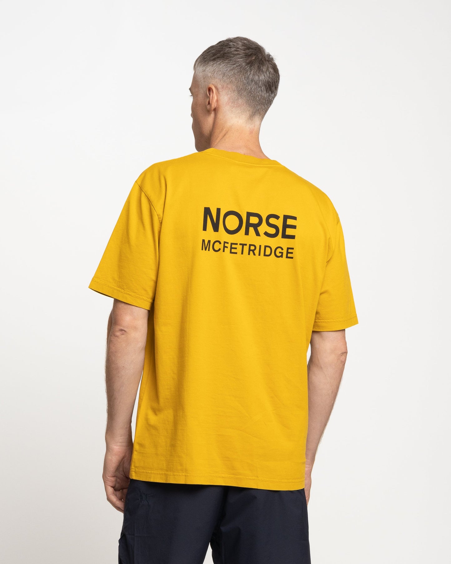 Norse Projects x GM Johannes Dancing Men T-Shirt in Turmeric Yellow