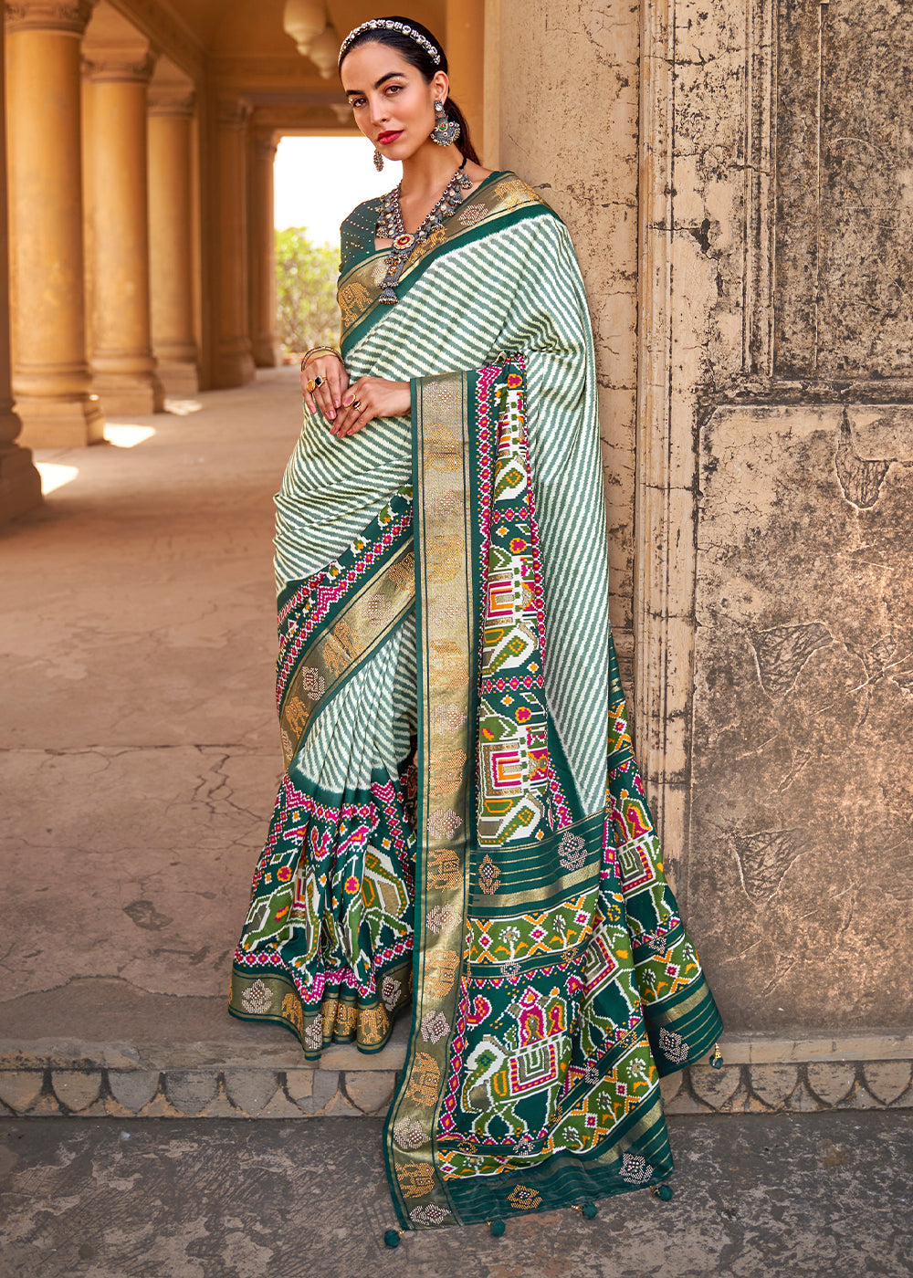 Dark Green Designer Patola Silk Saree with Zari Border & Stone work(Pre-Order)