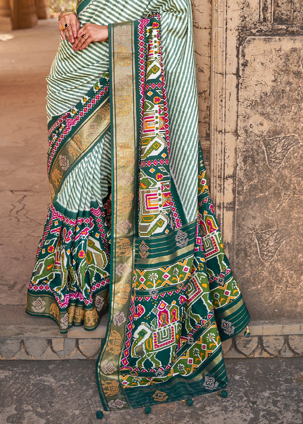 Dark Green Designer Patola Silk Saree with Zari Border & Stone work(Pre-Order)