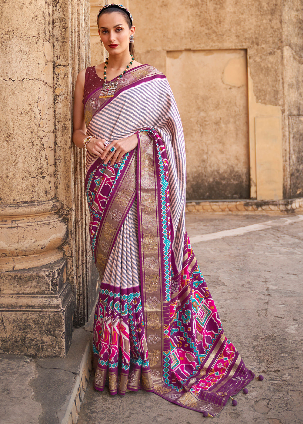 Tyrian Purple Designer Patola Silk Saree with Zari Border & Stone work