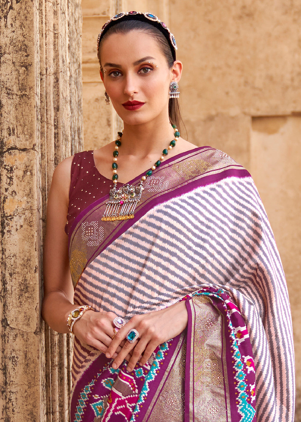 Tyrian Purple Designer Patola Silk Saree with Zari Border & Stone work