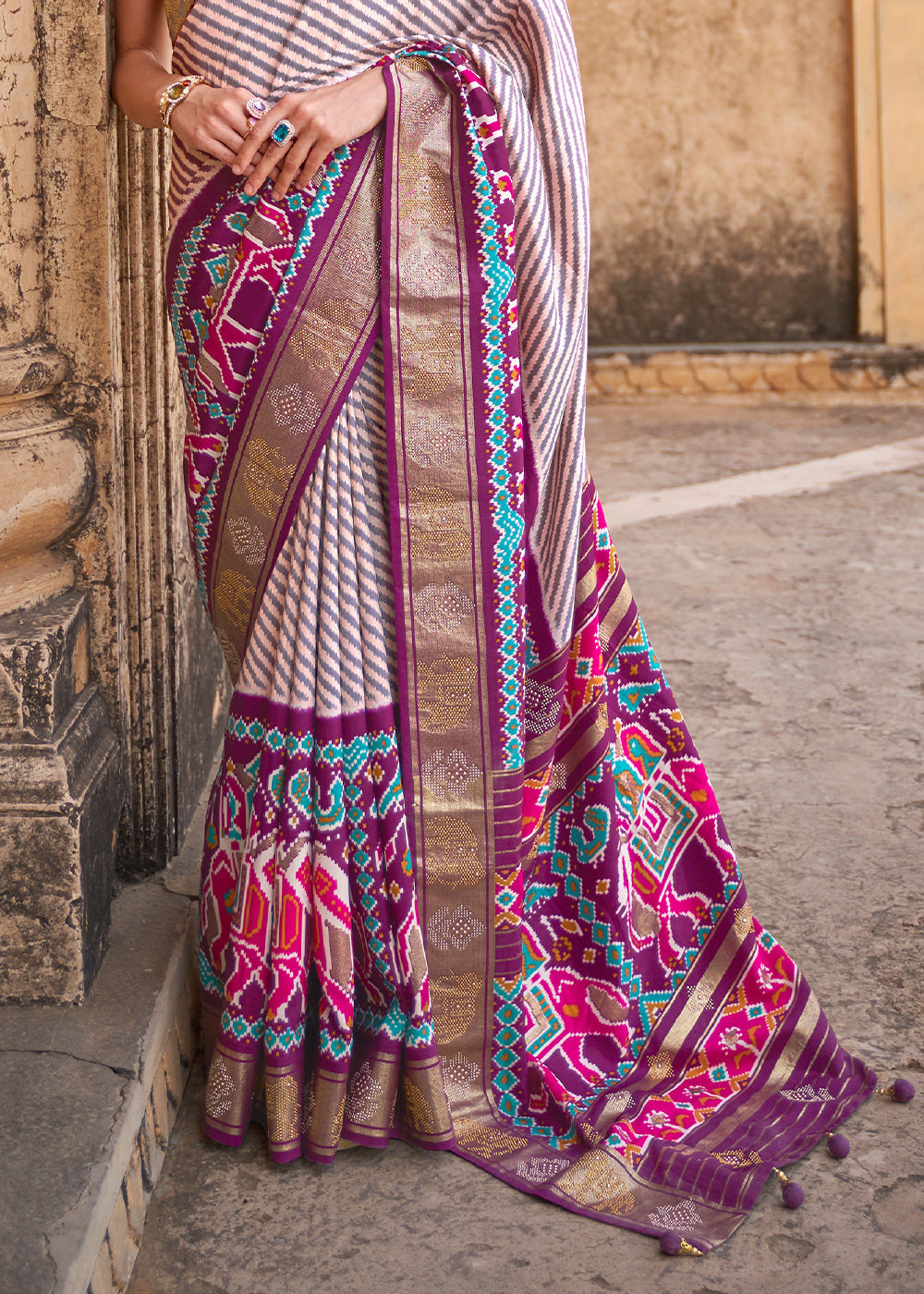 Tyrian Purple Designer Patola Silk Saree with Zari Border & Stone work