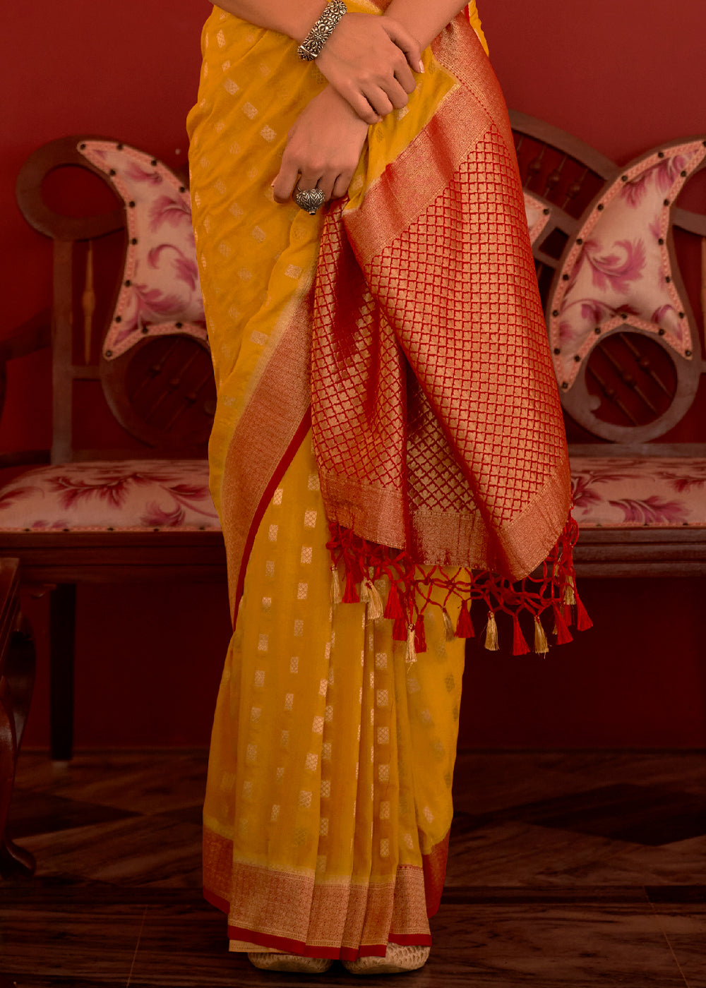 Saffron Yellow Zari Woven Georgette Saree with Contrast Border & Blouse