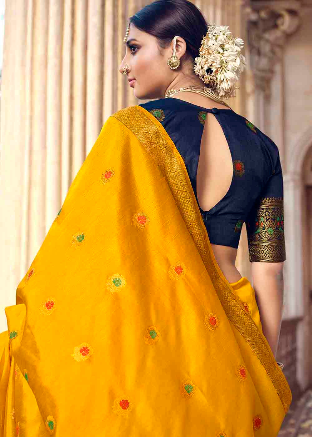 Saffron Yellow Floral Zari Woven Raw Silk Saree