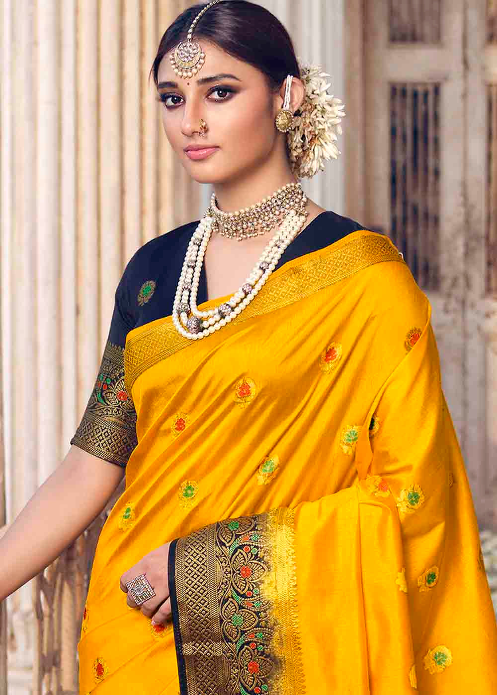 Saffron Yellow Floral Zari Woven Raw Silk Saree