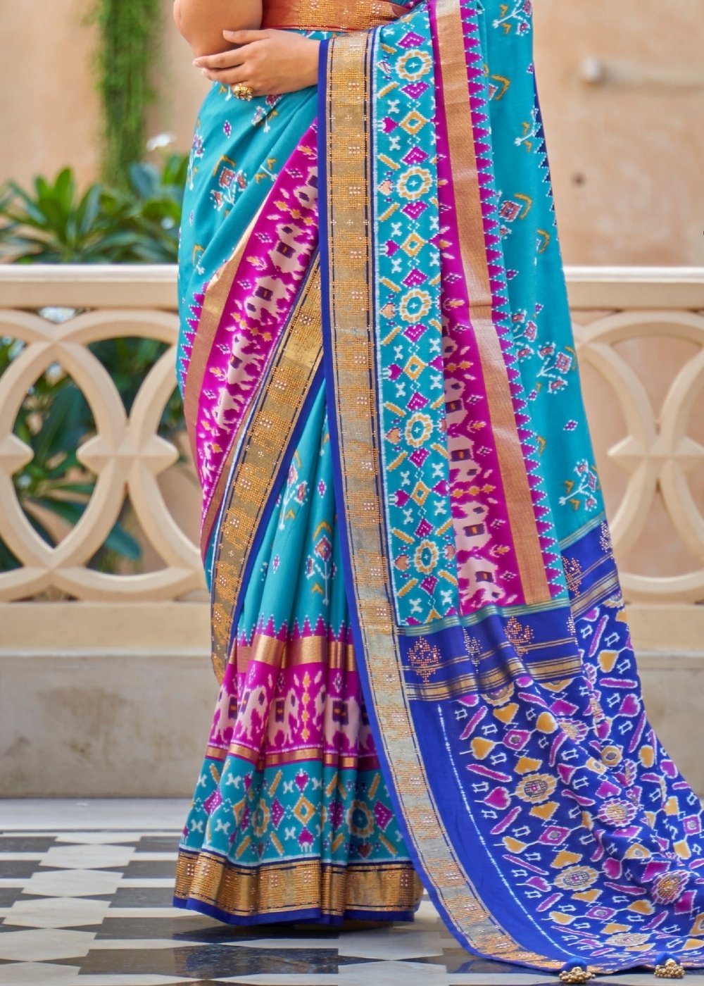 Cerulean Blue Patola Silk Saree with Zari Border & Tassels On Pallu