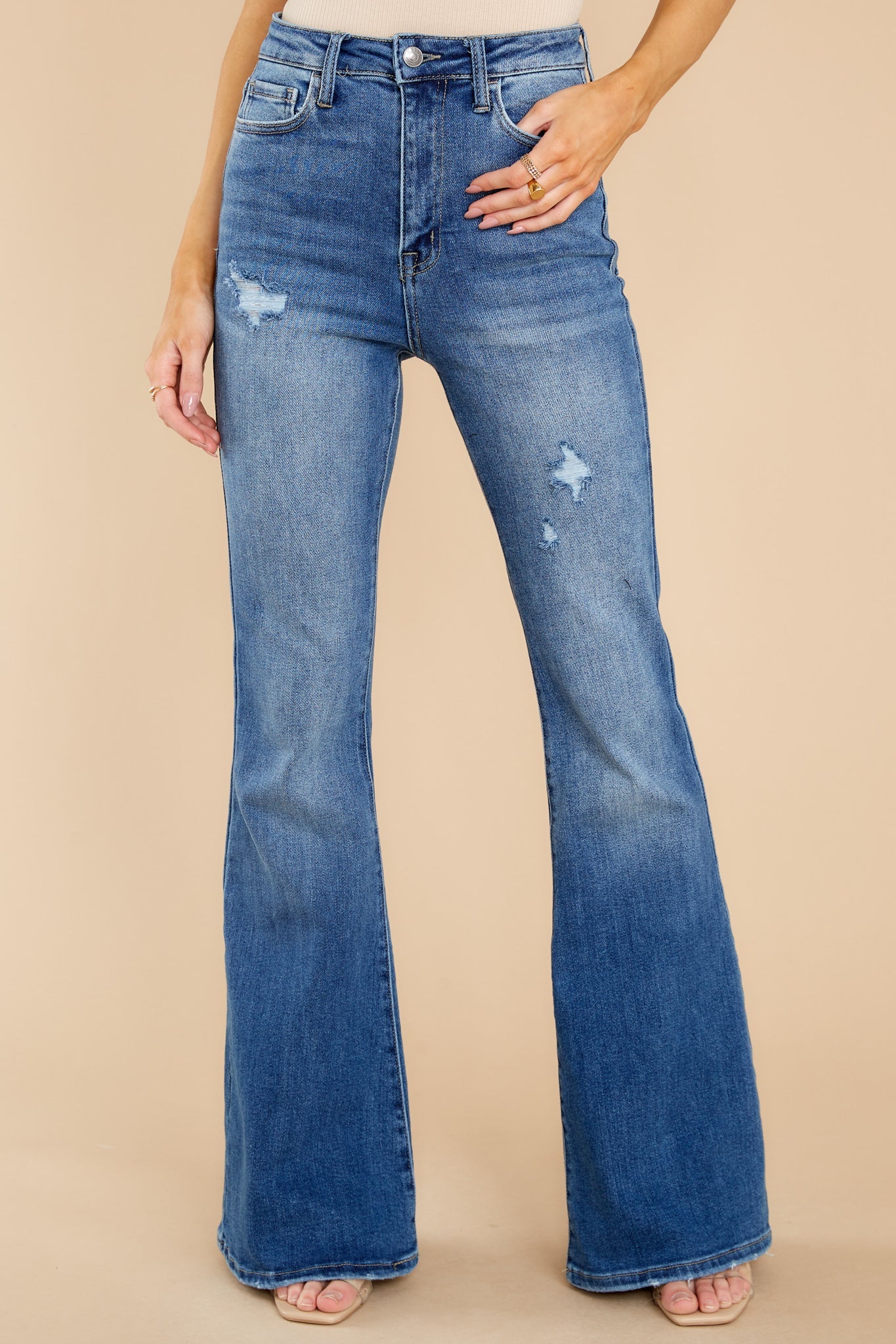 Why So Serious Medium Wash Distressed Flare Jeans