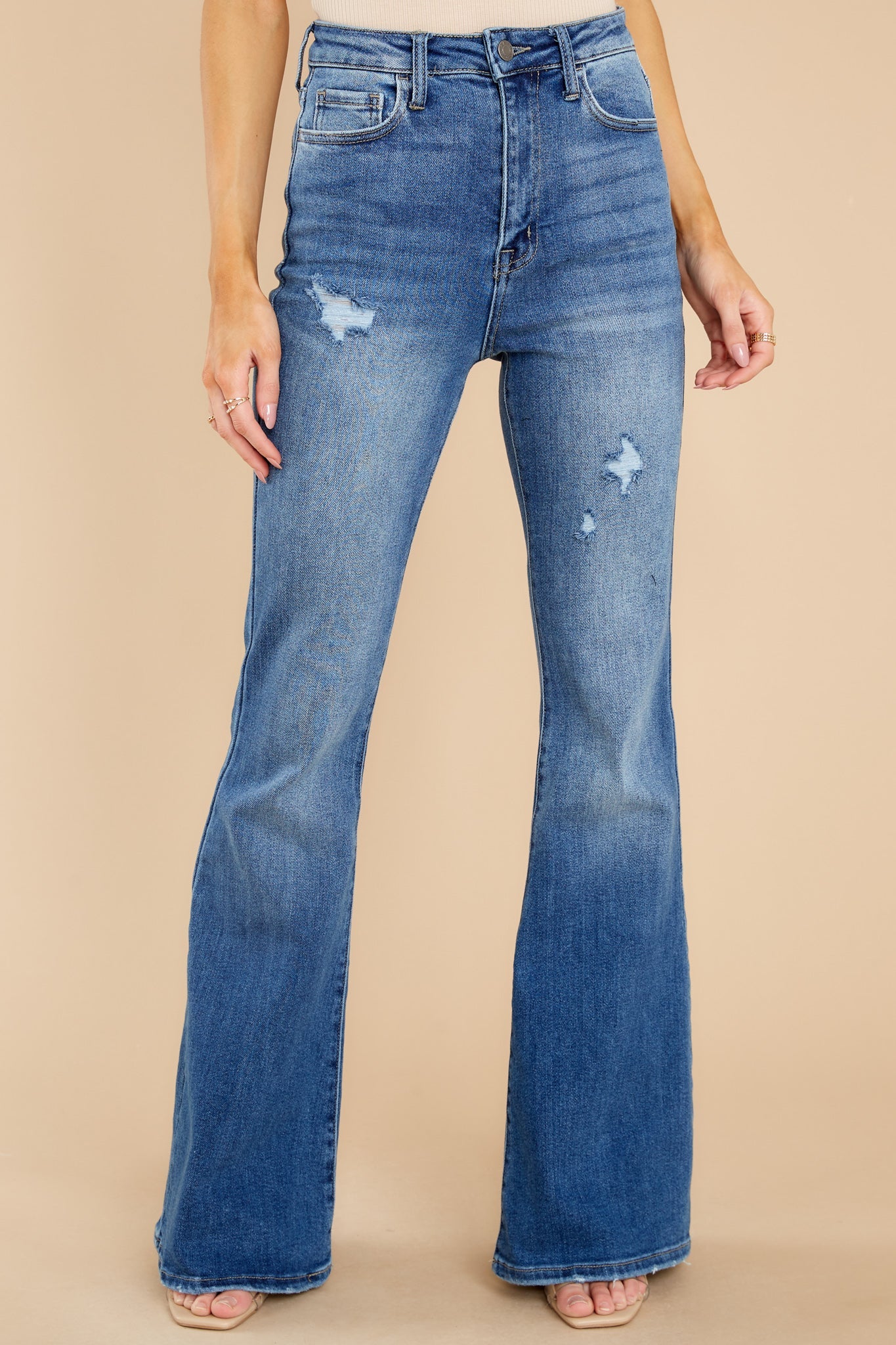 Why So Serious Medium Wash Distressed Flare Jeans