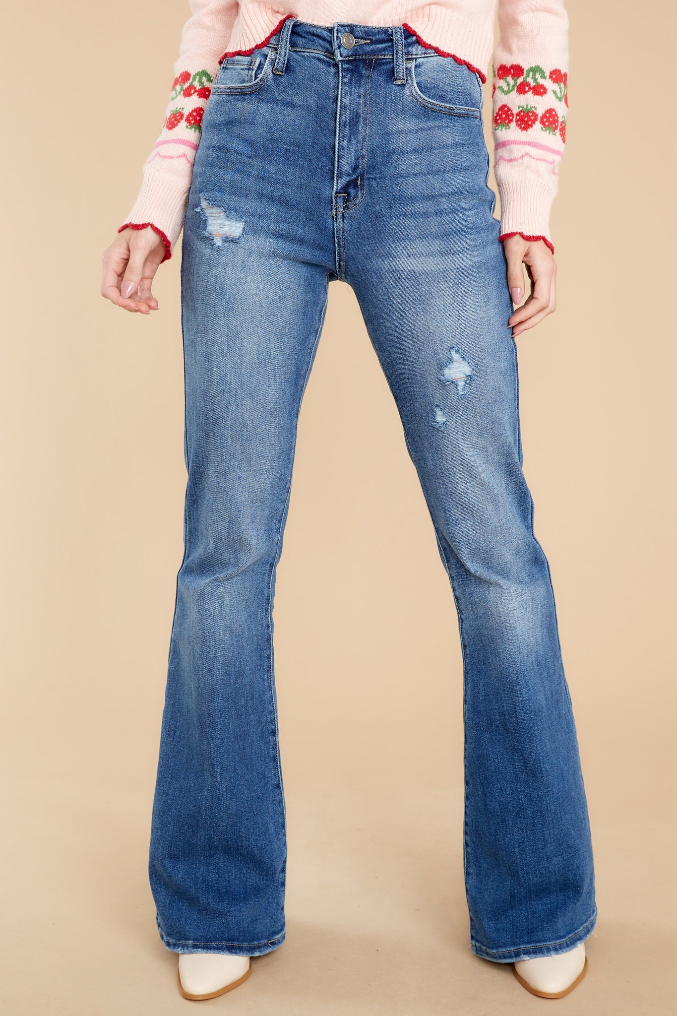 Why So Serious Medium Wash Distressed Flare Jeans