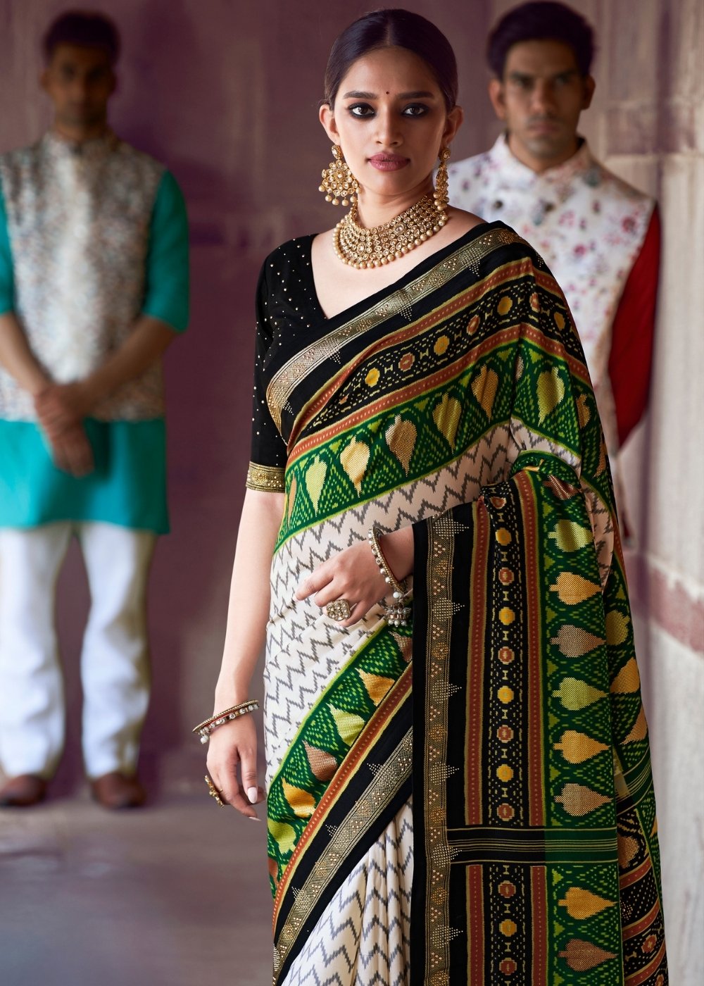 Daisy White & Green Patola Silk Saree with Zari Border Pallu & Stone work