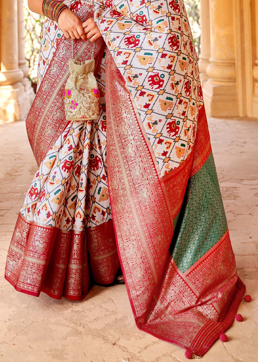 Pearl White Printed Patola Silk Saree with Zari Border & Tassels on Pallu(Pre-Order)