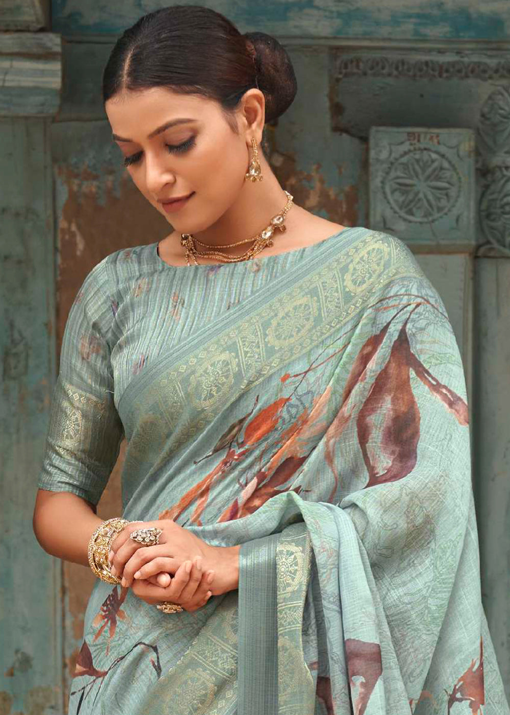 Shades Of Blue Floral Printed linen Saree with Zari Border