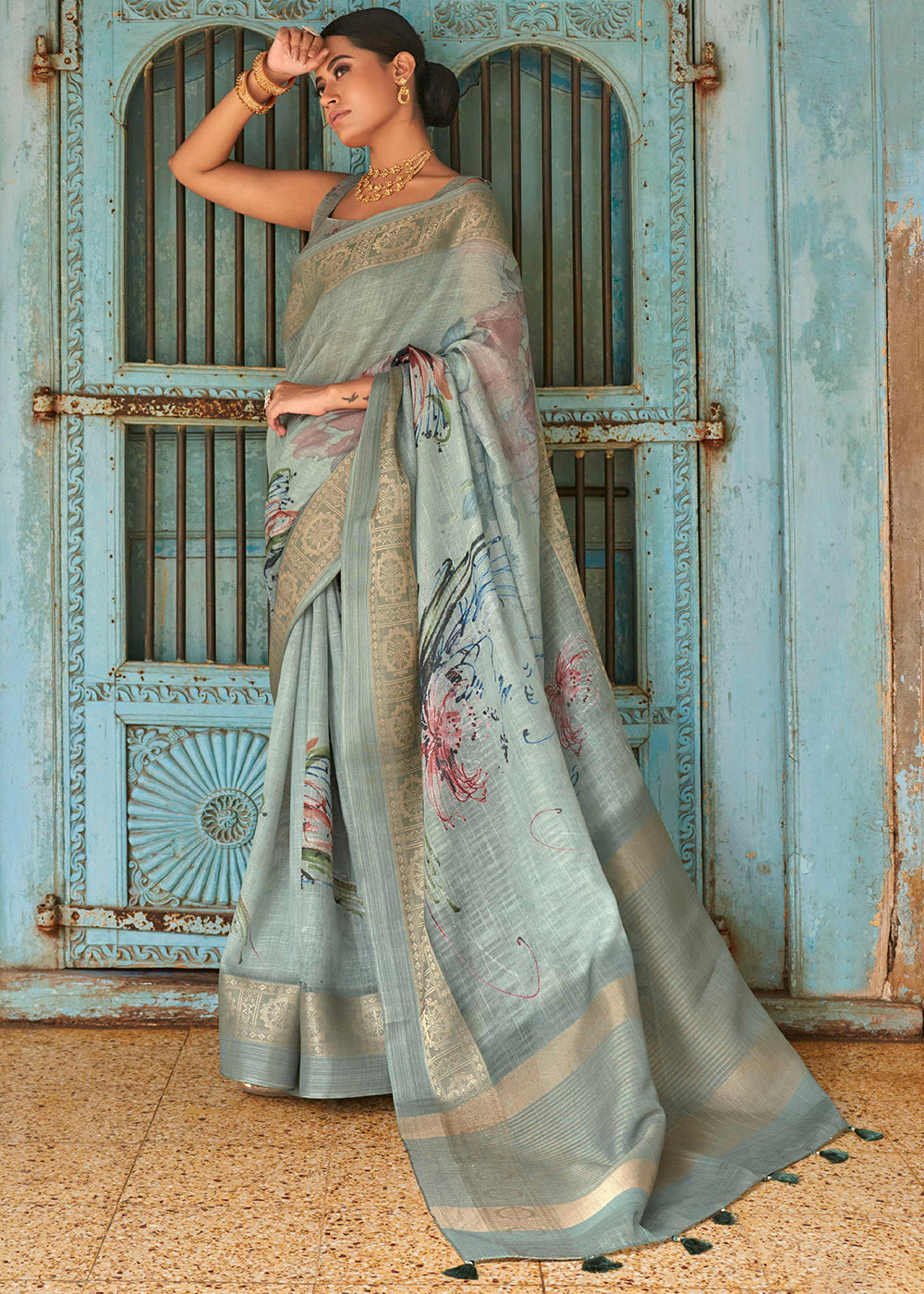 Shades Of Green Floral Printed linen Saree with Zari Border