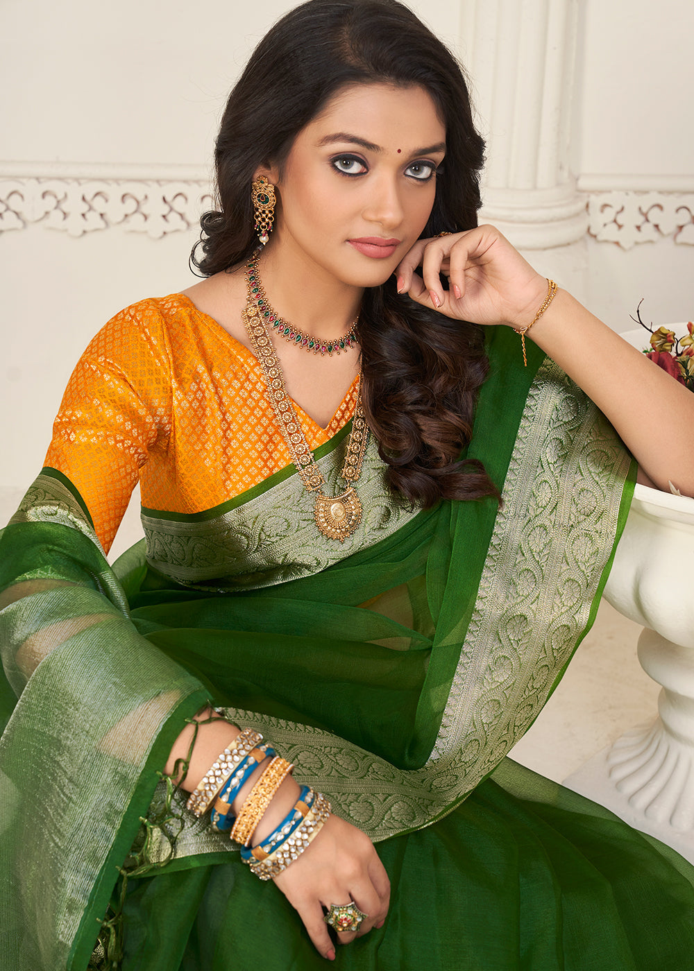 Hunter Green Designer Organza Silk Saree with Tassels On Pallu