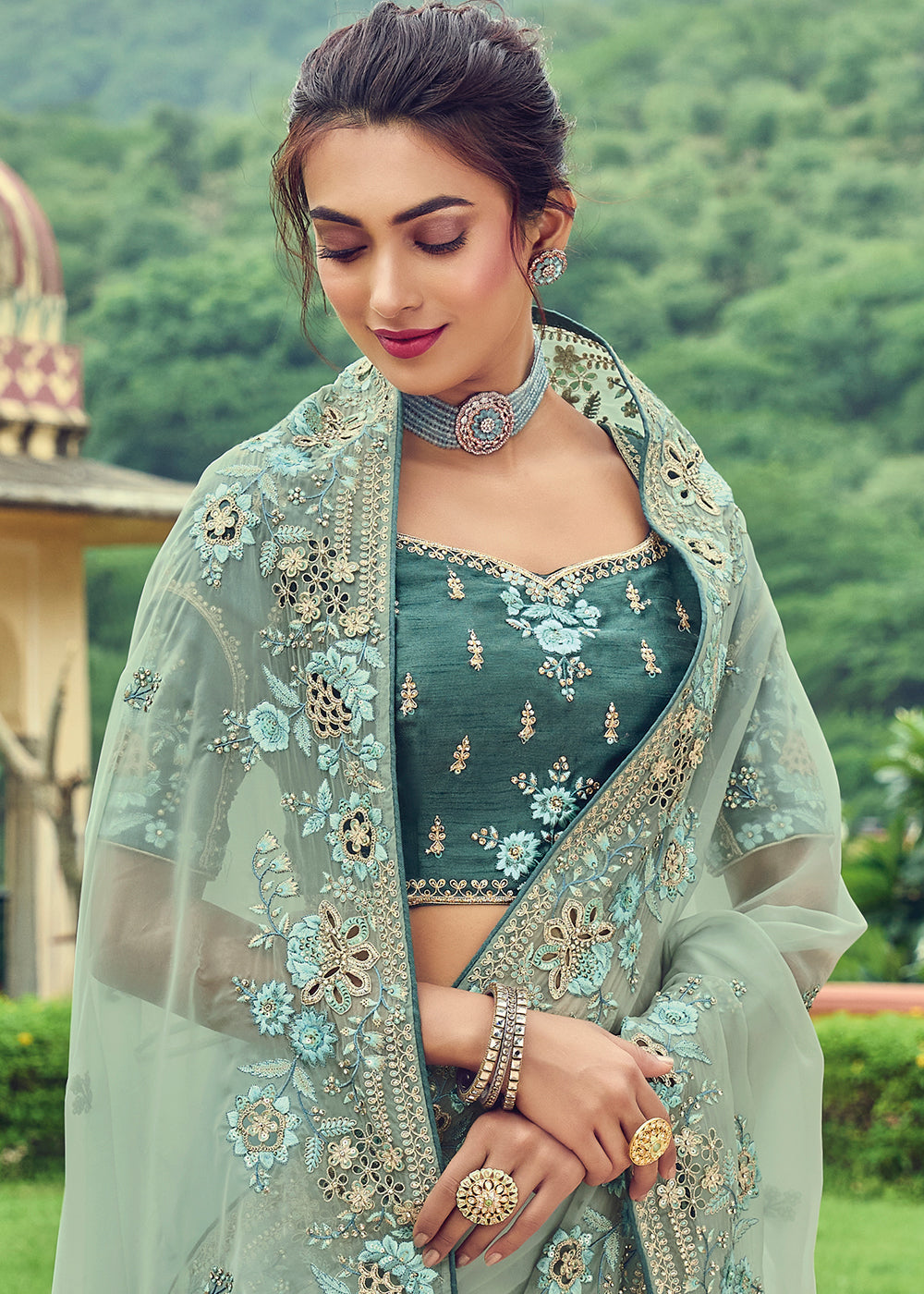 Moss Green Designer Organza Saree with Intricate Embroidery work