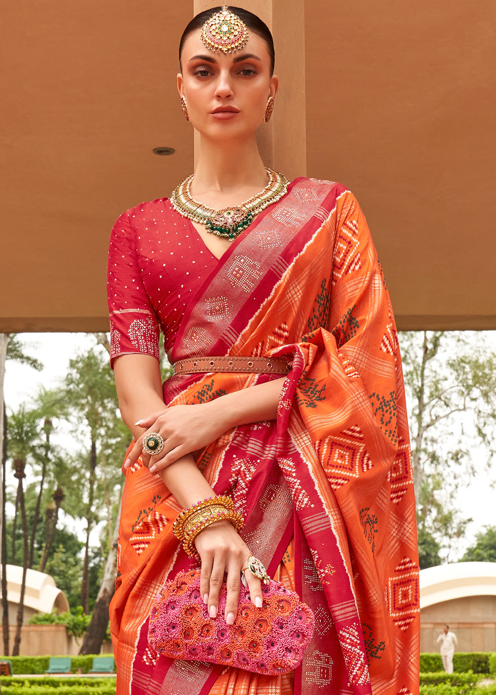 Tangerine Orange Printed Patola Silk Saree with Swaroski Work