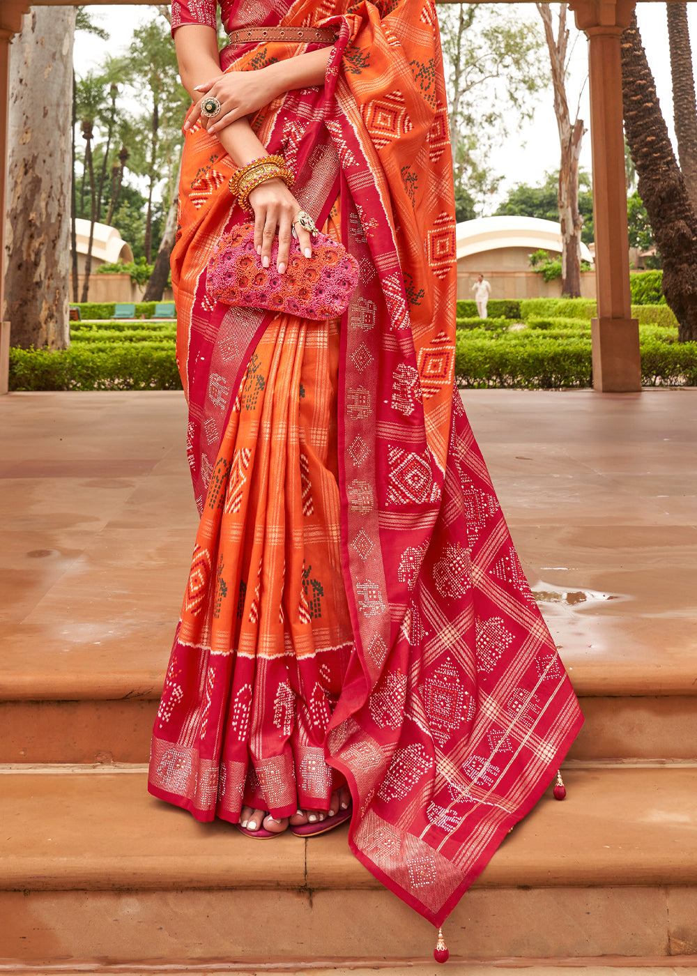 Tangerine Orange Printed Patola Silk Saree with Swaroski Work