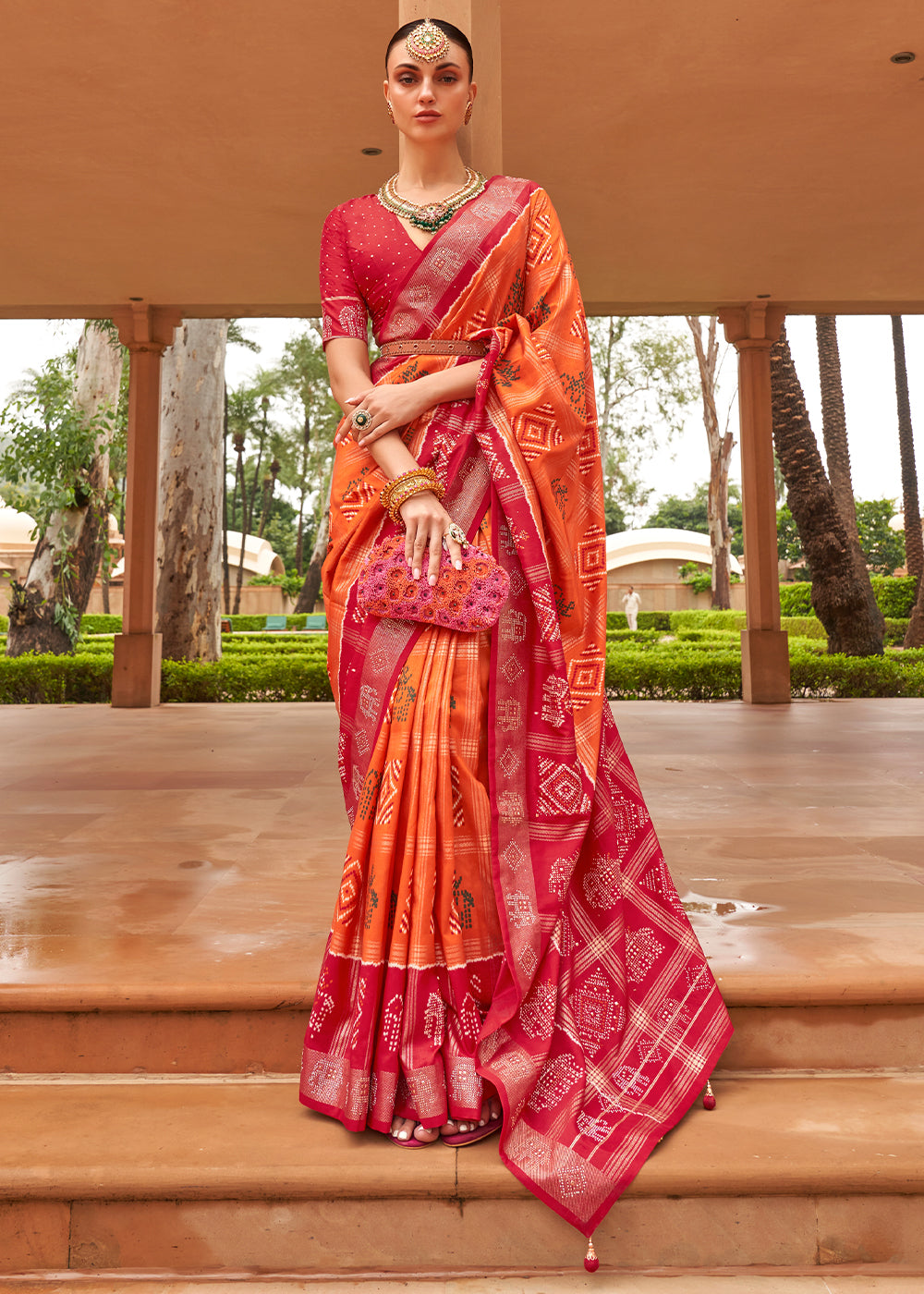 Tangerine Orange Printed Patola Silk Saree with Swaroski Work