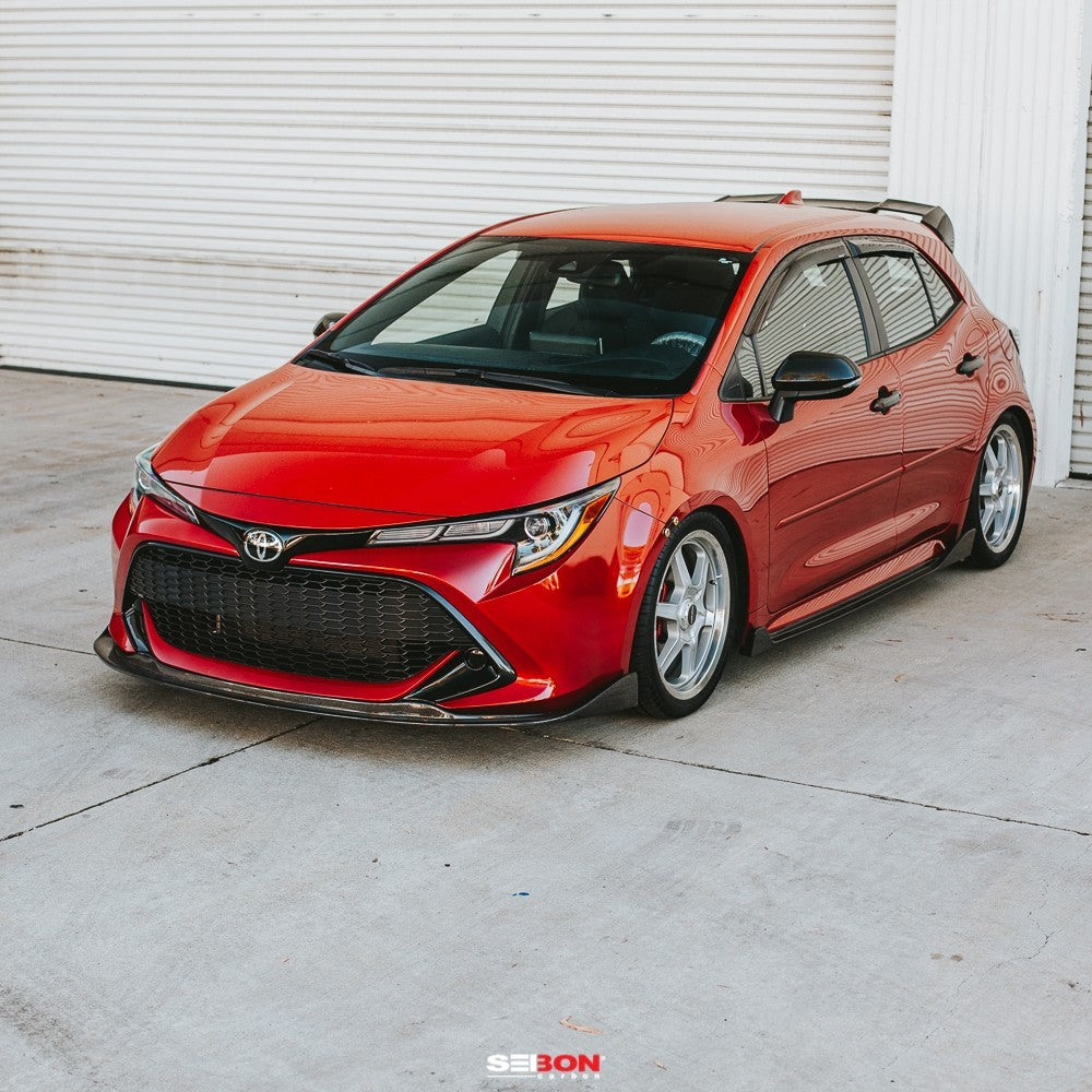 Seibon 19-21 Toyota Corolla Hatchback MB-Style Carbon Fiber Front Lip (seiFL19TYCORHB-MB)