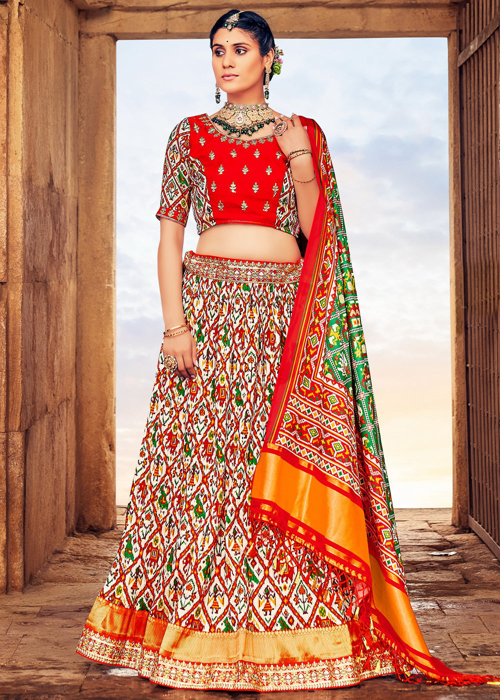 White & Red Patola Printed Banarasi Silk Lehenga Choli with Embroidery Work