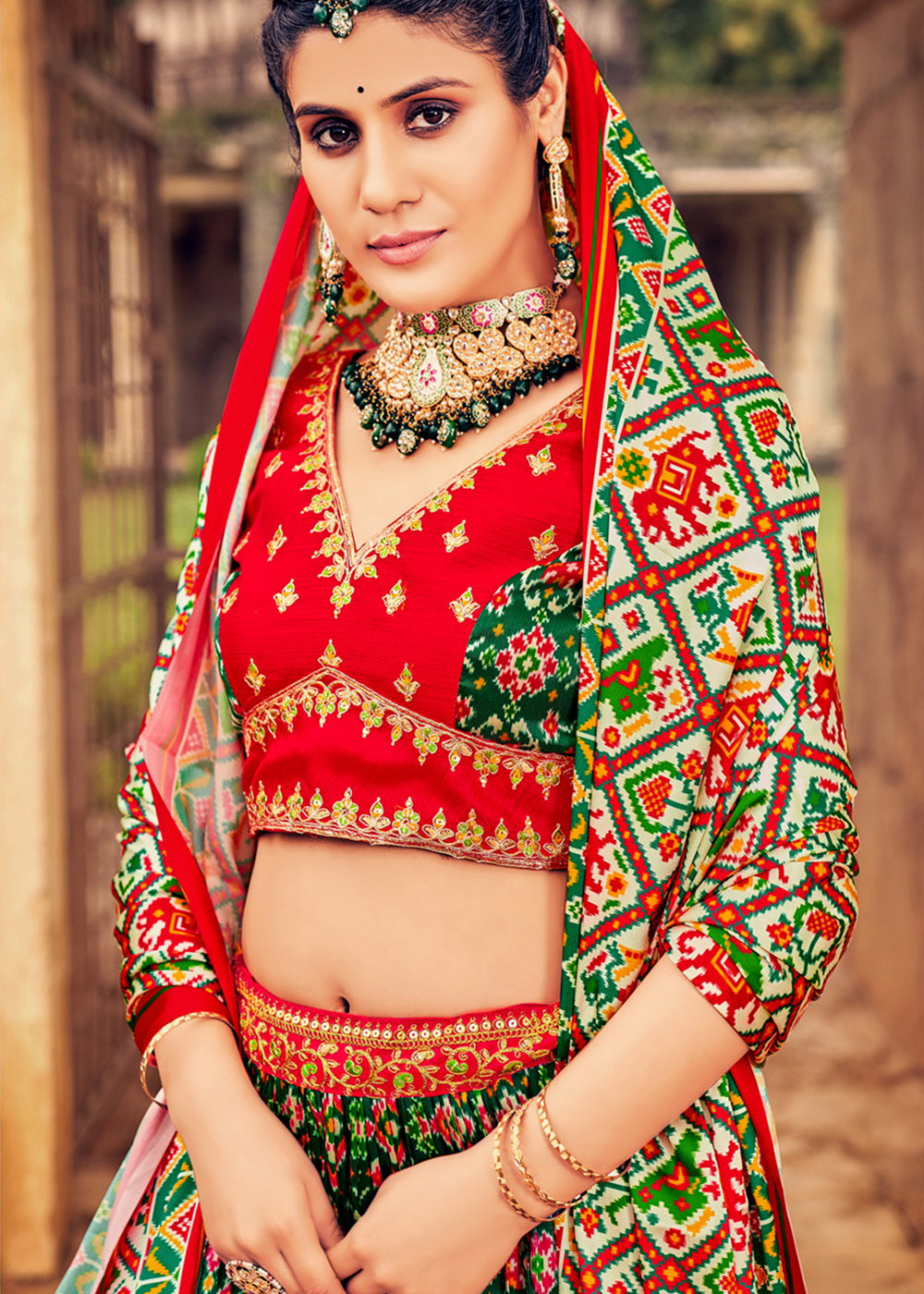 Green & Red Patola Printed Banarasi Silk Lehenga Choli with Embroidery Work