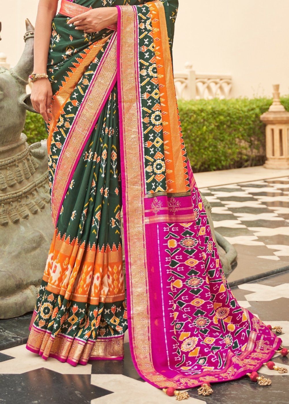 Green & Pink Patola Silk Saree with Zari Border & Tassels On Pallu