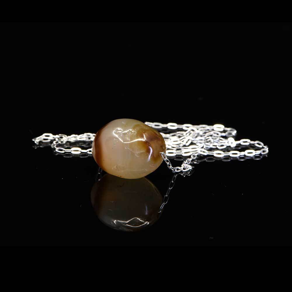 A Near Eastern Banded Agate Bead set as a pendant, ca. 1st millennium BCE