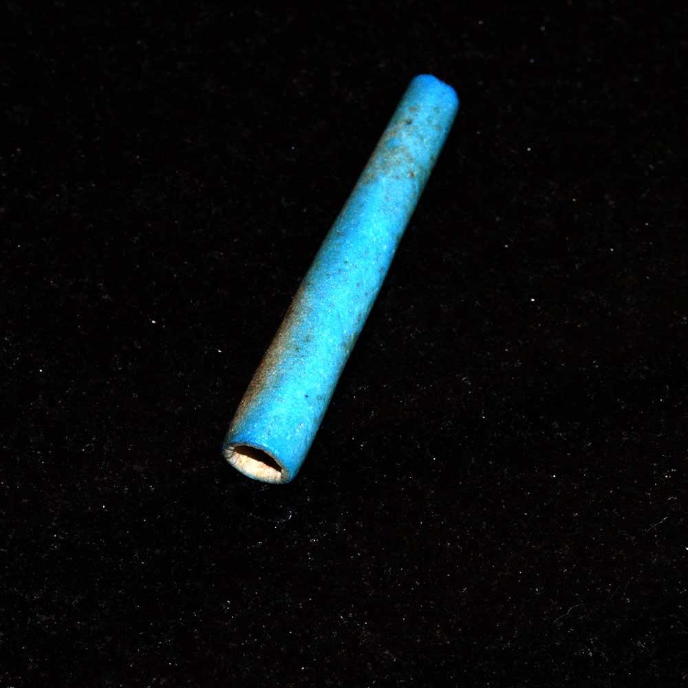 A rare Egyptian Blue Faience Flail Bead, New Kingdom, ca. 1550-1069 BCE