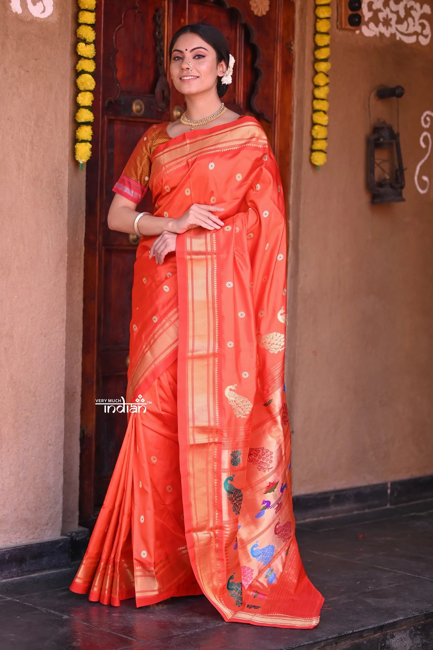 Raaga~Traditional Handloom Pure Silk Orange Paithani with Grand Peacocks Pallu