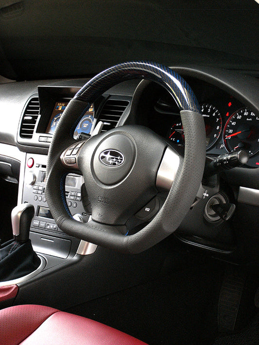 DAMD D-Shape Blue Carbon x Blue Stitch Steering Wheel - 05-07 WRX/ STi, 04-06 Legacy/ Outback, 03-08 Forester