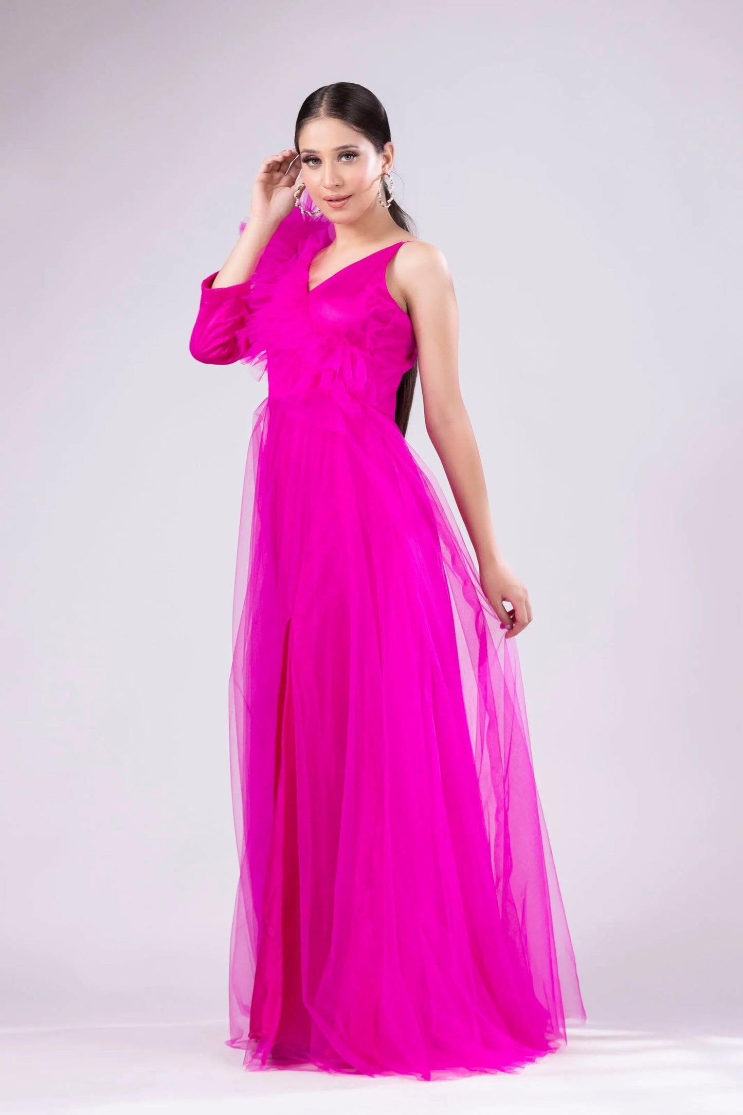 Hot pink gown with ruffle on shoulder