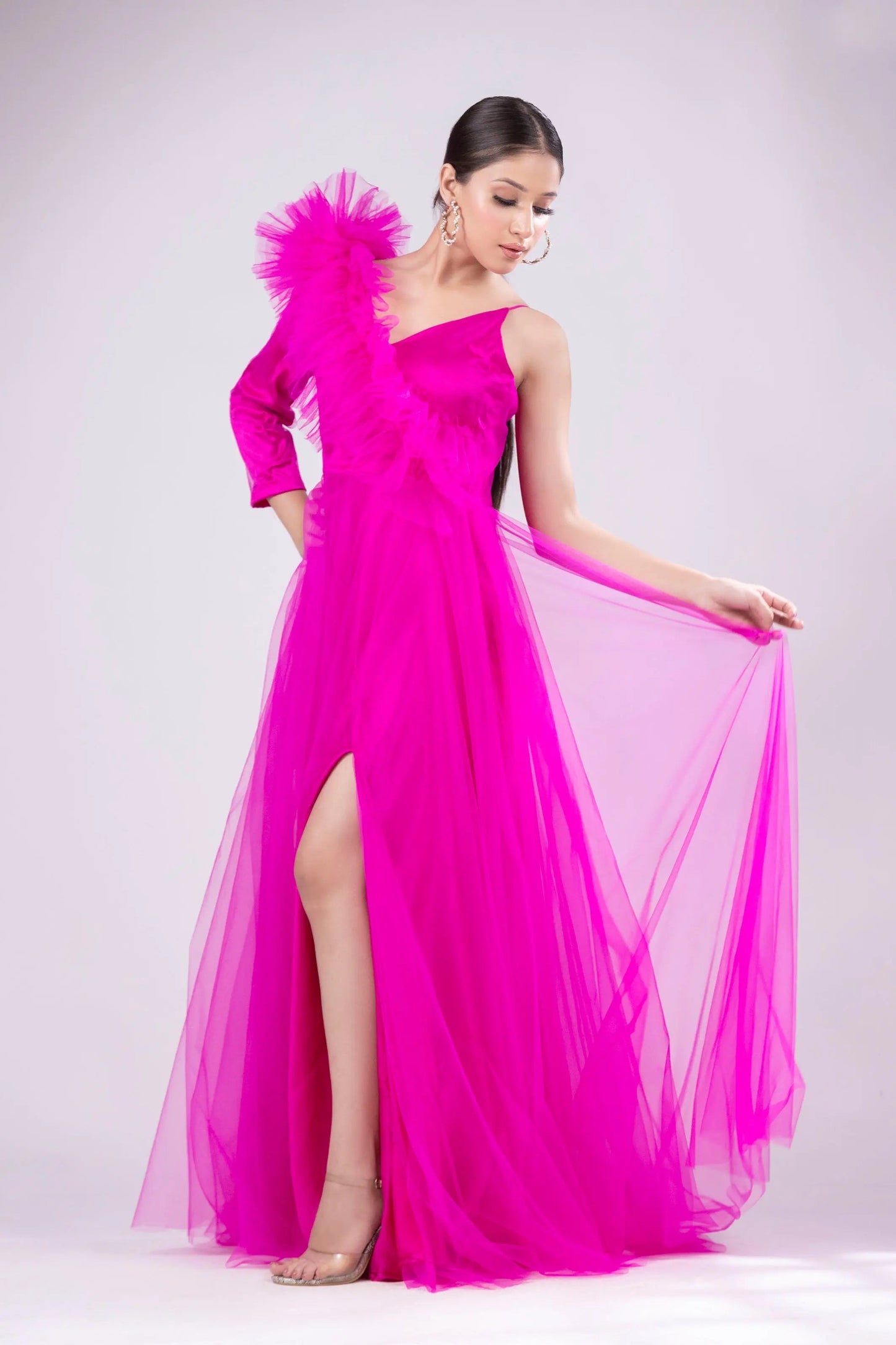 Hot pink gown with ruffle on shoulder