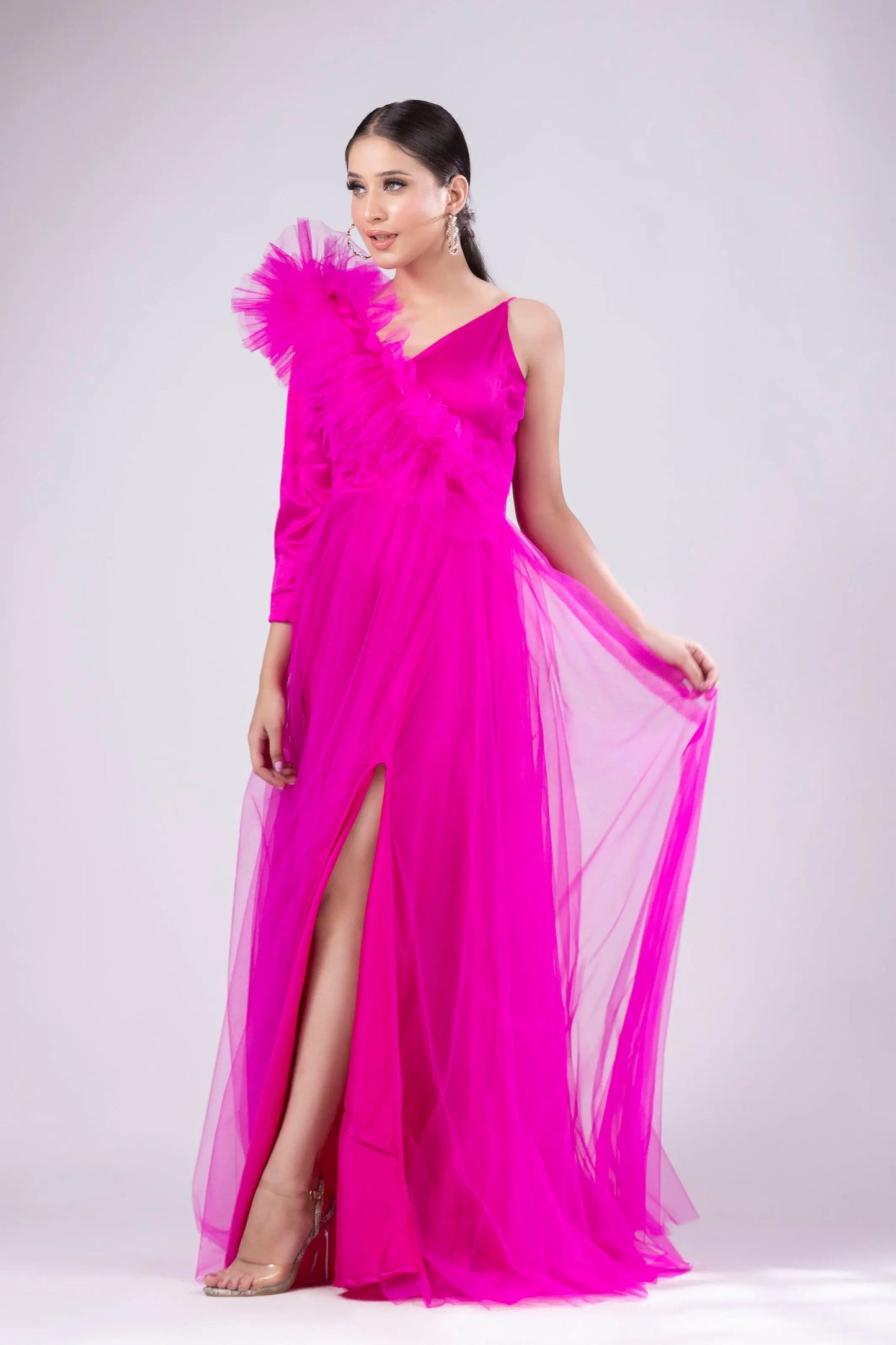 Hot pink gown with ruffle on shoulder