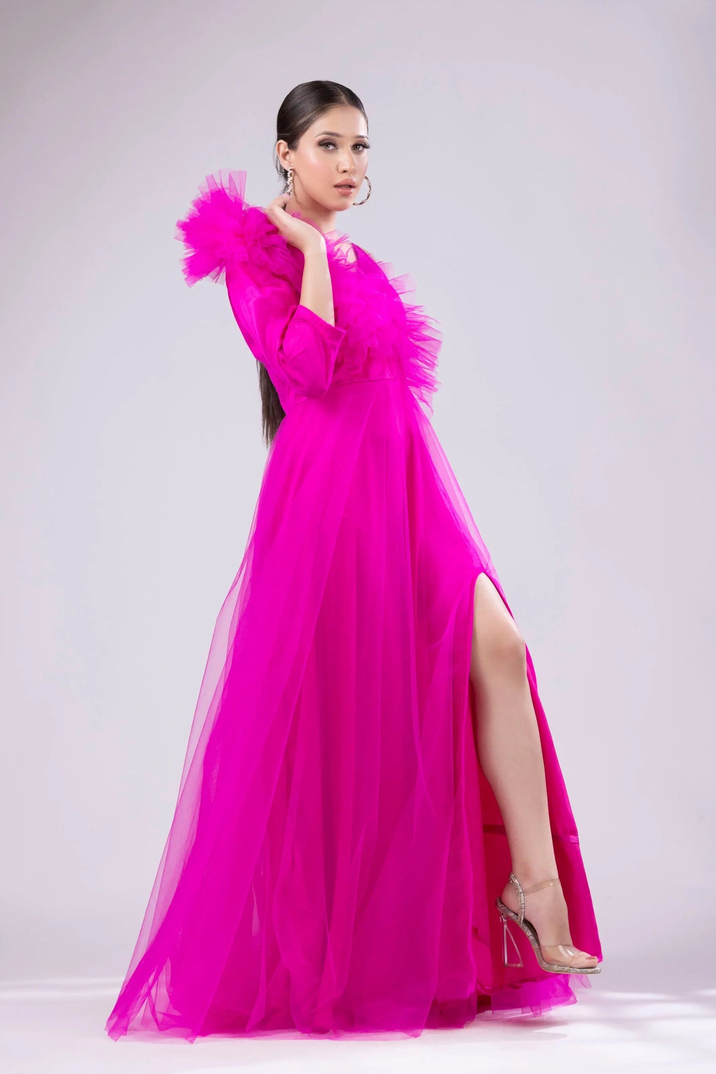 Hot pink gown with ruffle on shoulder