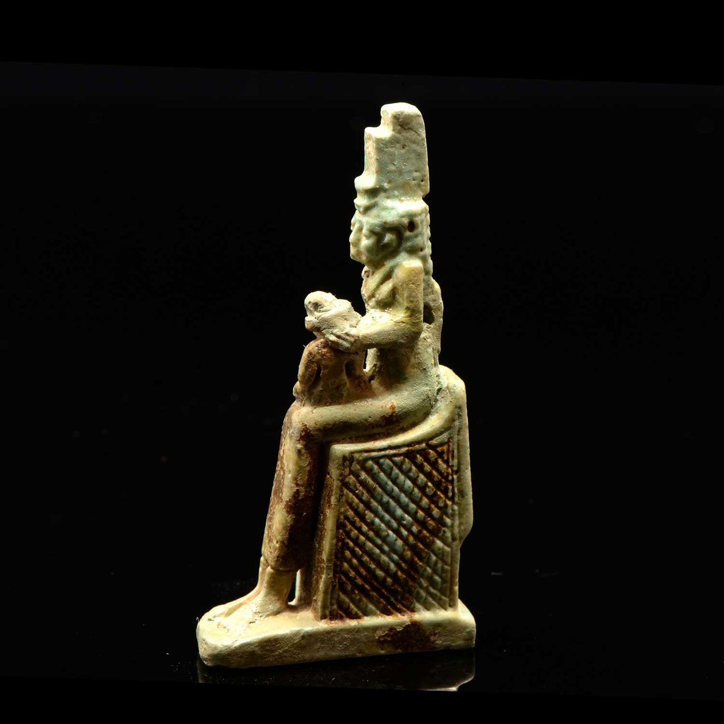An Egyptian Faience Isis & Horus Amulet, 26th Dynasty, ca. 664-525 BCE