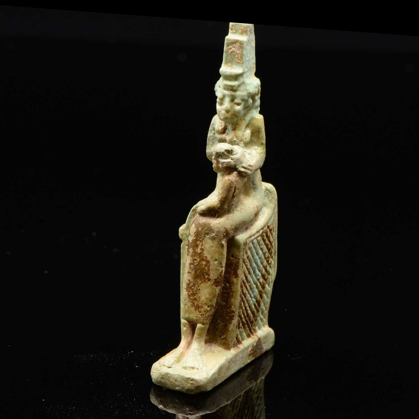 An Egyptian Faience Isis & Horus Amulet, 26th Dynasty, ca. 664-525 BCE