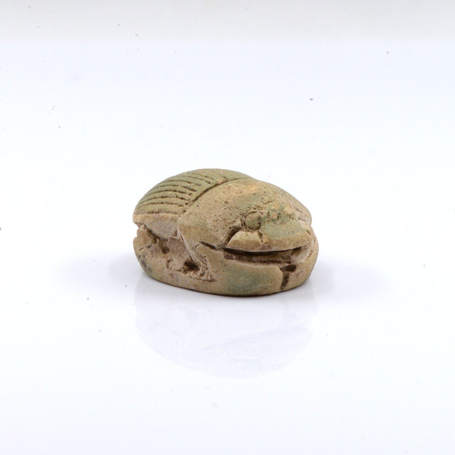 A large Egyptian Pale Green Glazed Scarab, Late Period, Dynasty 26, ca. 664 - 525 BCE