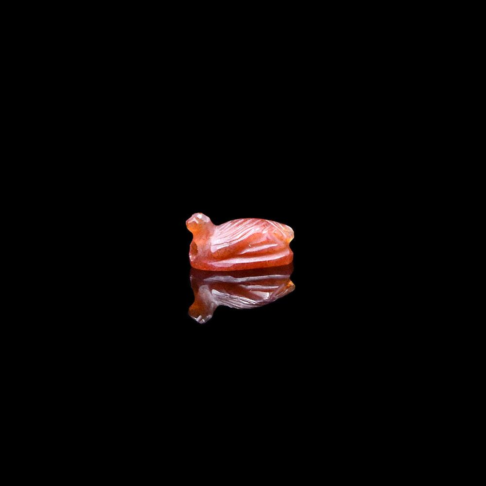 An Egyptian Carnelian Amulet of a Bird, New Kingdom, ca. 1550 - 1295 BCE