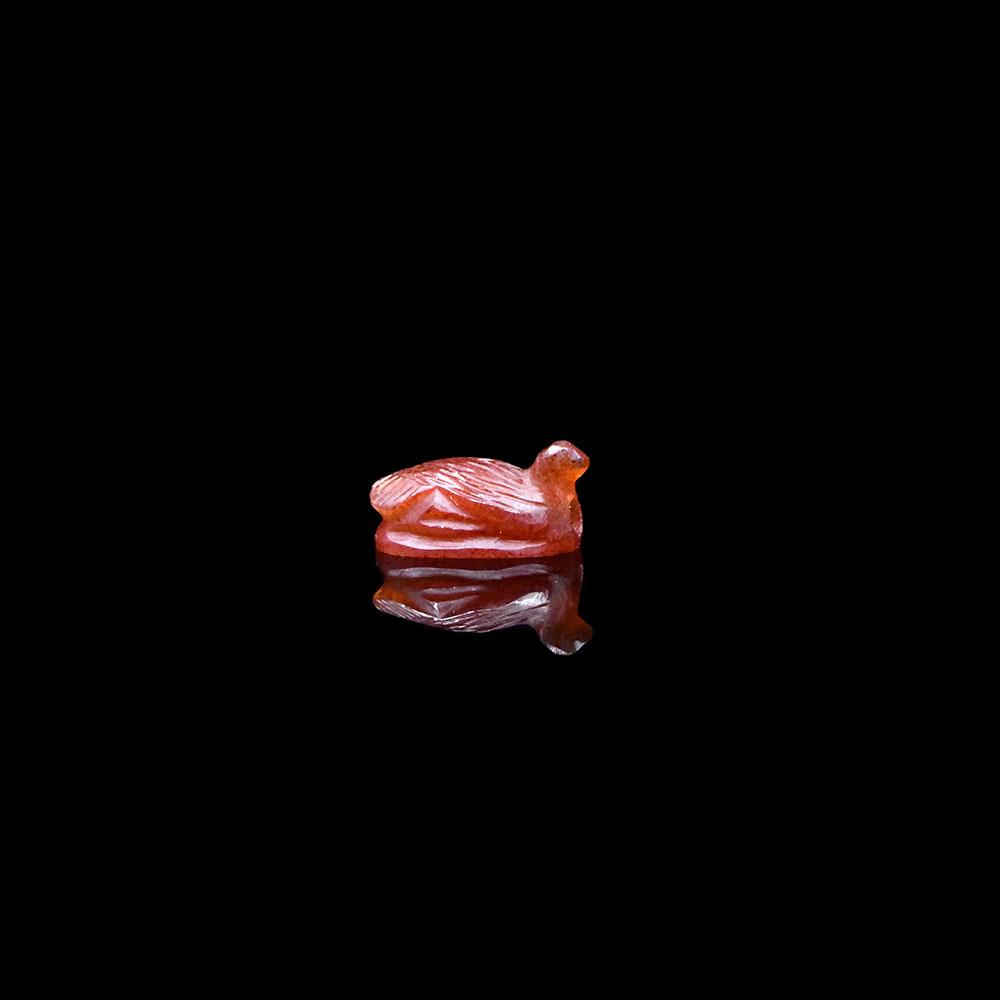 An Egyptian Carnelian Amulet of a Bird, New Kingdom, ca. 1550 - 1295 BCE