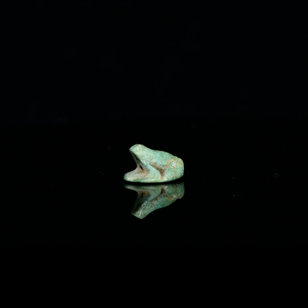 An Egyptian Faience Frog Amulet, New Kingdom, Dynasty 18, ca. 1539-1292 BCE