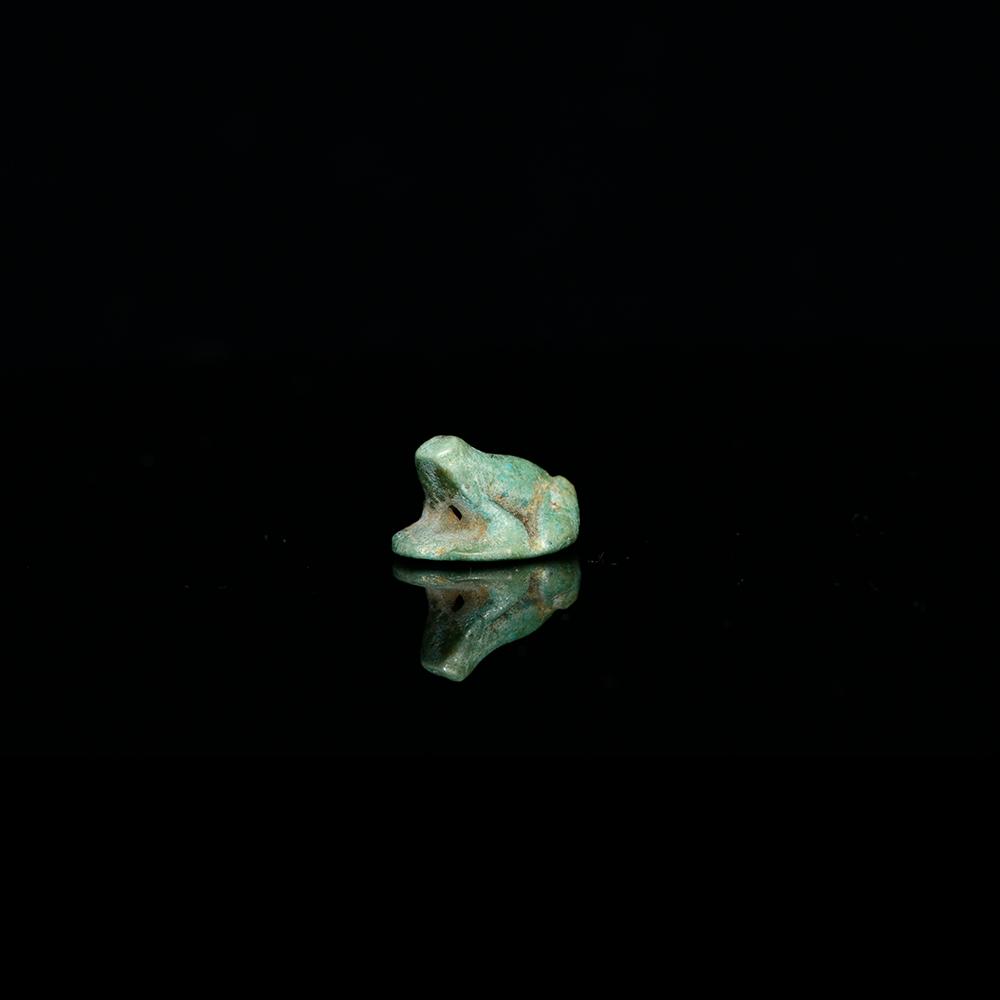 An Egyptian Faience Frog Amulet, New Kingdom, Dynasty 18, ca. 1539-1292 BCE