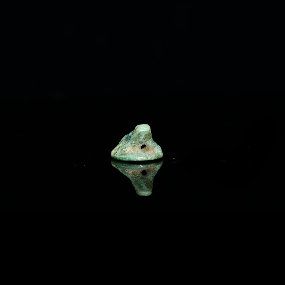 An Egyptian Faience Frog Amulet, New Kingdom, Dynasty 18, ca. 1539-1292 BCE