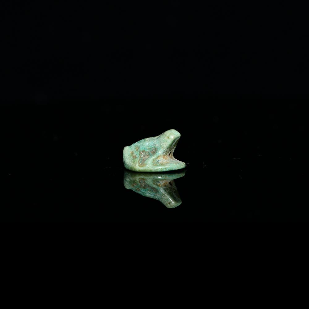 An Egyptian Faience Frog Amulet, New Kingdom, Dynasty 18, ca. 1539-1292 BCE