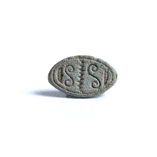 An Egyptian Blue Faience Design Scaraboid, 2nd Intermediate Period, ca. 1650 - 1550 BCE
