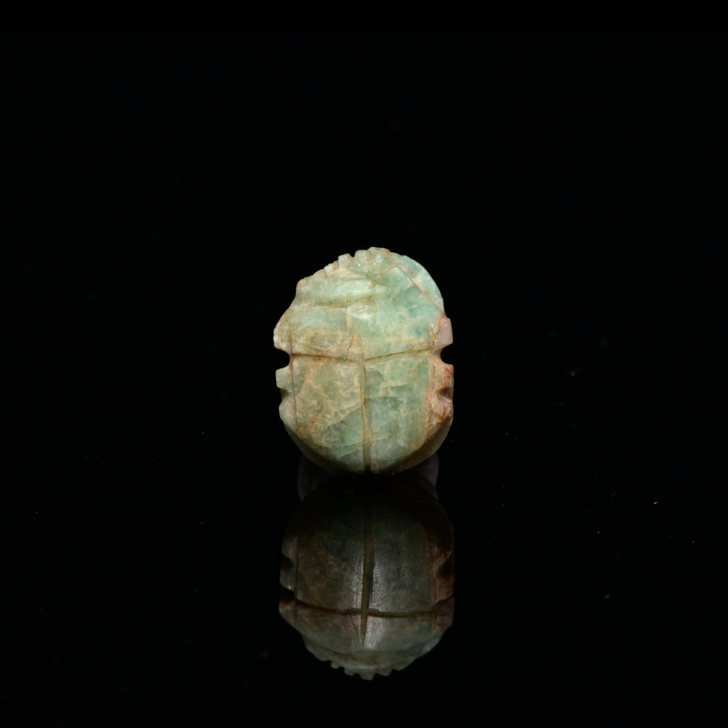 A rare Egyptian Green Feldspar Scarab, Late Period, ca. 664 - 332 BCE