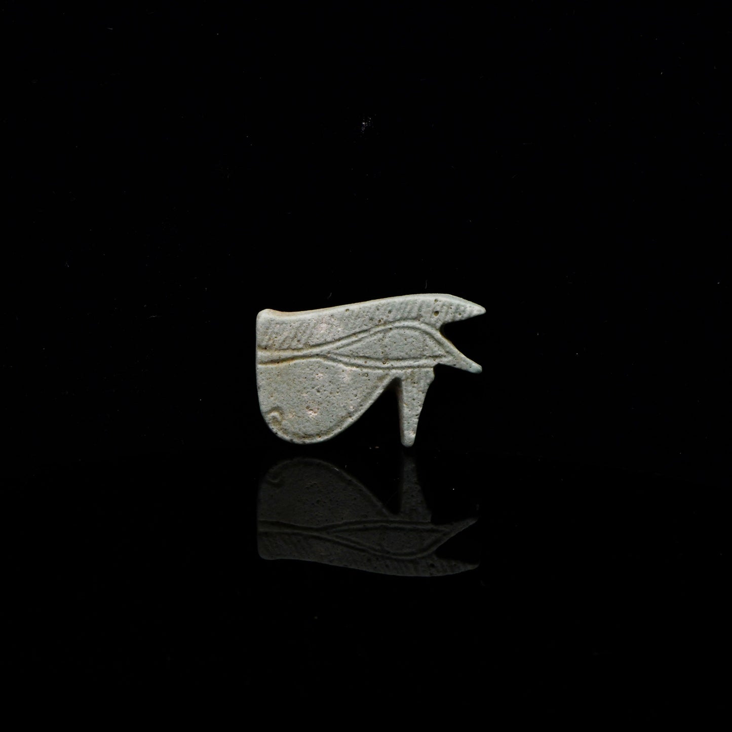 An Egyptian Faience Wedjet Eye Amulet, Late Period, ca. 664 - 332 BCE